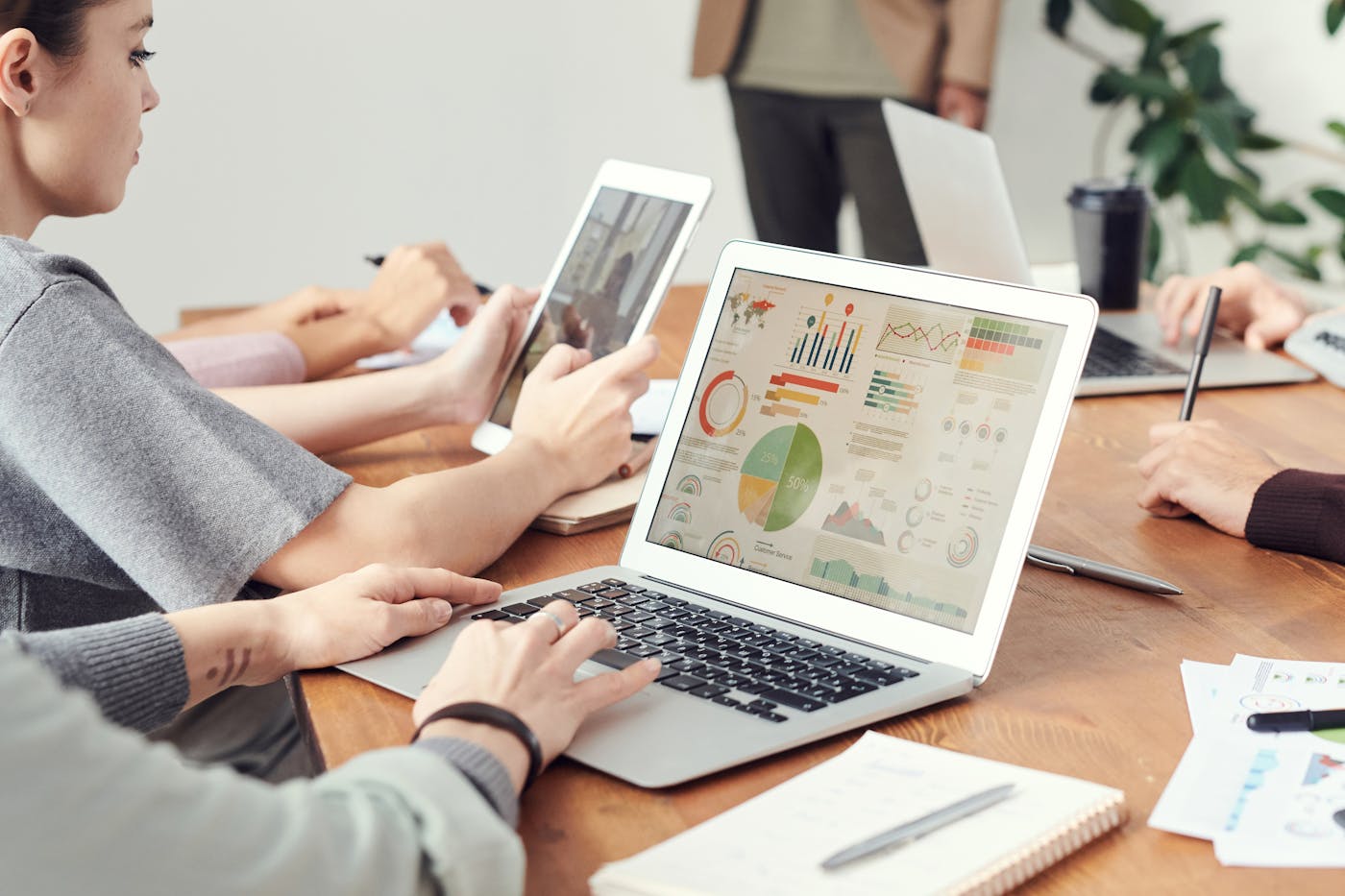 Agency team reviewing analytics on a laptop